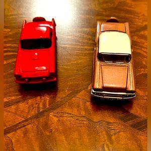 Two toy cars, collectible, Thunderbird and Chevy. 1955 Thunderbird.